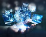 Tech devices and icons connected to digital planet earth Businesswoman connected tech devices and icons applications to a digital planet earth